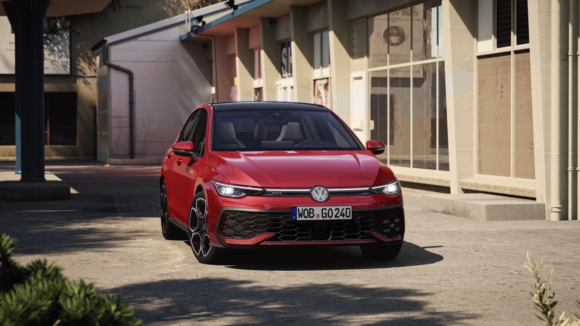 2025 Volkswagen Golf GTI, featuring red pinstripe accents and dual exhaust pipes.