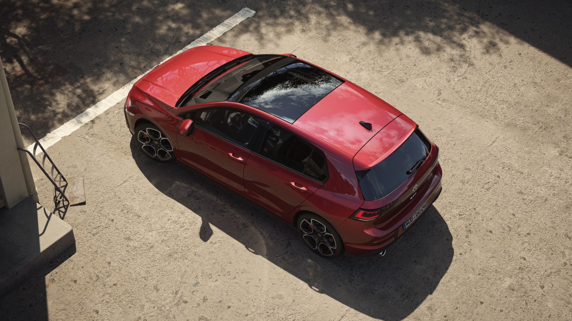 Overhead view of a red Volkswagen Golf GTI.