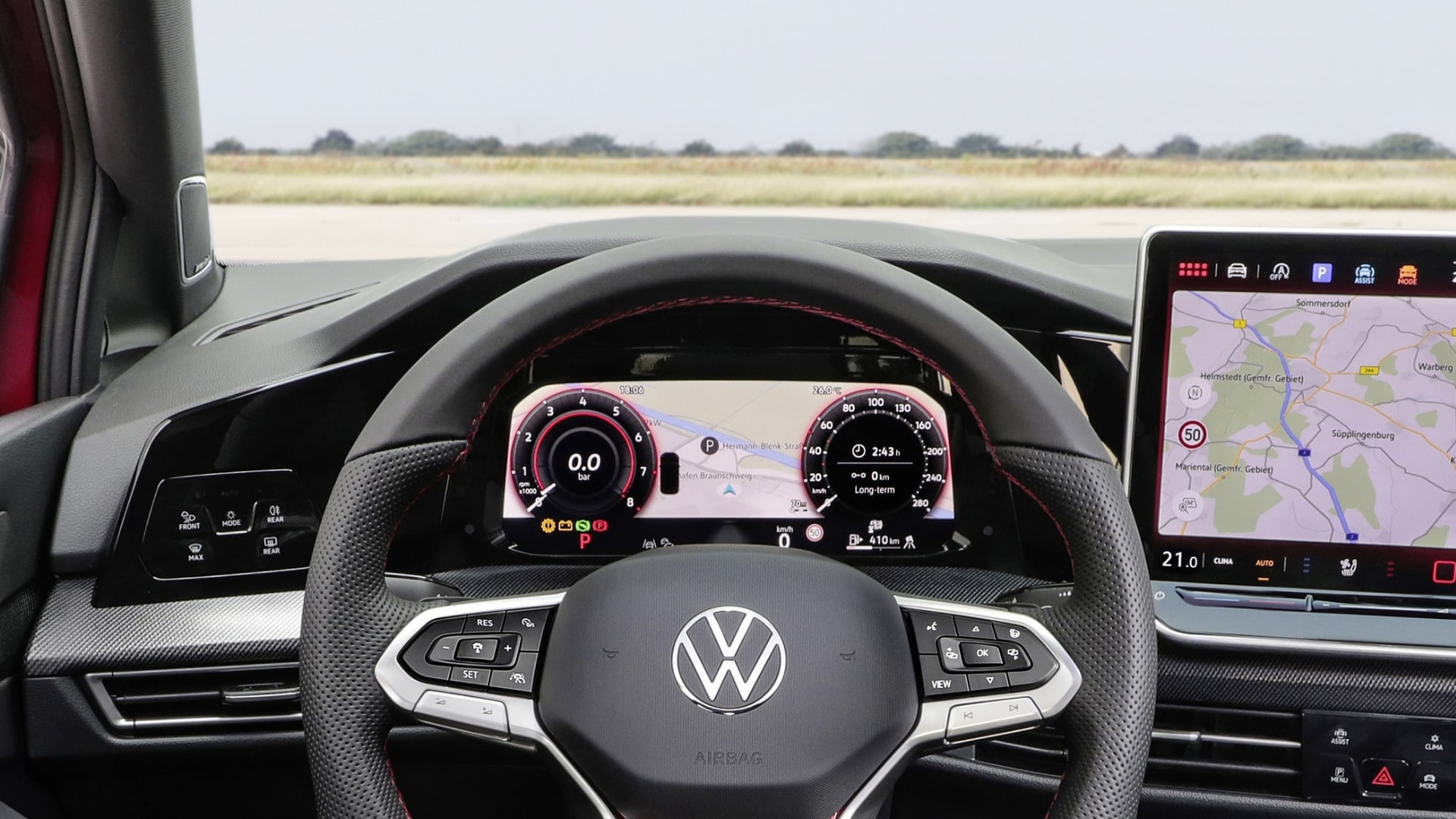 Volkswagen Golf GTI dashboard featuring the available Head-Up Display (HUD), projecting key driver information onto the windshield.